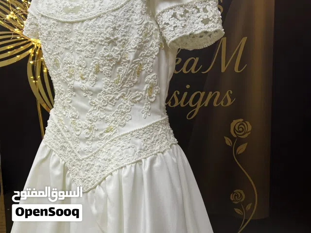 فساتين زفاف ابيض