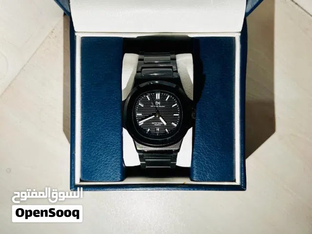 Diamond Milanese watch, luxurious black color.