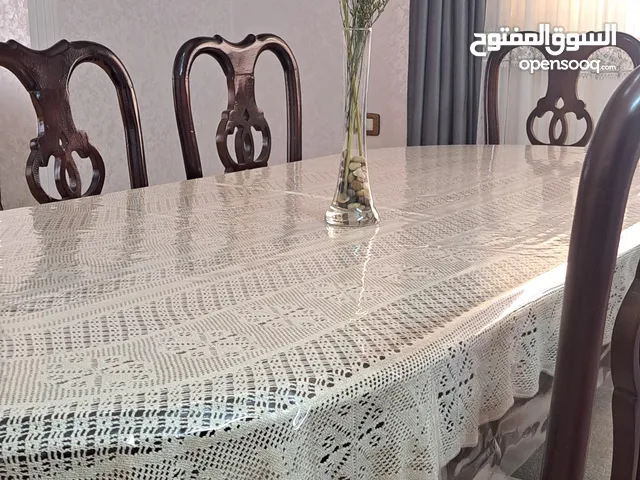 طاوله سفره مع 8 كراسي خشب زان لون عسلي غامق
