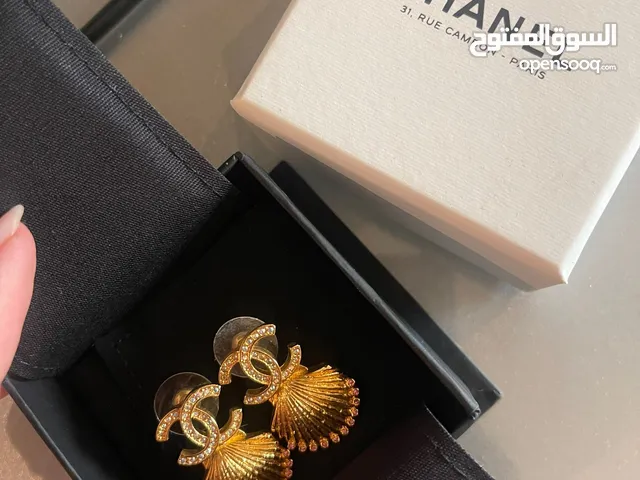 Chanel Small Gold Shell earrings with logo