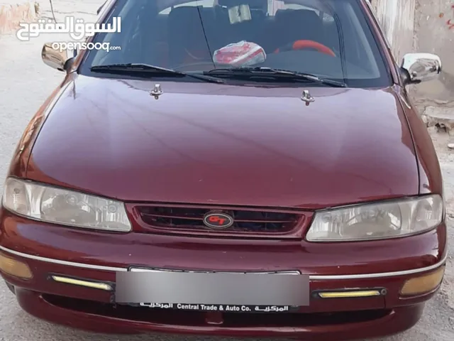 كيا سيفيا لون خمري مالك واحد من الحره فحص كامل اربعه جيد