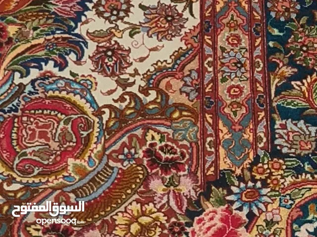 سجادة إيرانية تَبريزِيّة بدرجة 60 عُقدة