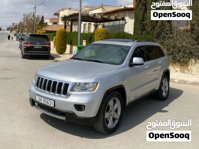 جيب جراند شيروكي فل الفل بفتحه 2011 فحص 2جيد أمامي بسعر مغري قابل للبدل