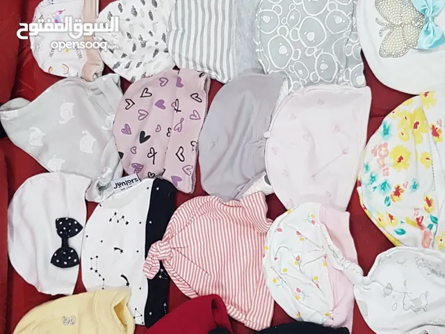 New born baby caps and onesie for sale