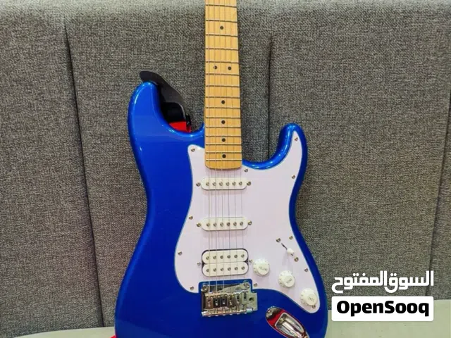 Blue Squier Strat-style Electric Guitar. Comes with a bag - Good Working Condition