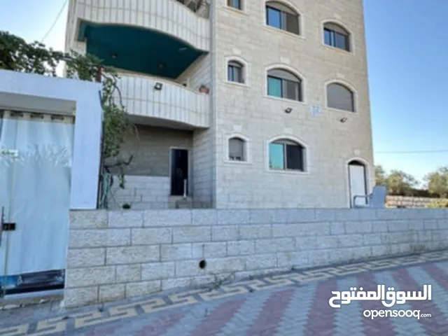 ارض دونم مع عمارة اربع طوابق للبيع
