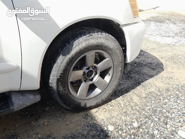 مطلوب غطا جنط - طاسة / ارمادا 2006