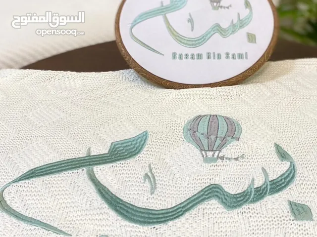 اطقم مواليد مطرزة