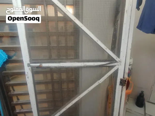 باب مانع الحشرات تفصل خشب