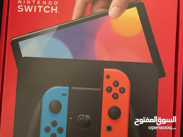 جهاز نينتندو سويتش OLED إصدار حديث + 4 ألعاب أصلية فيزيائية بحالة ممتازة جداً مع جميع الملحقات