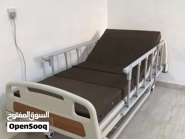 سرير طبي وكرسي كهربائي احتياجات خاصه