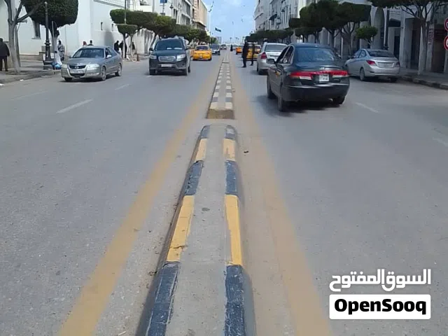 شقة ع رئسي تجارية لايجار شارع عمر المختار بالقرب من الميدان الشھداء