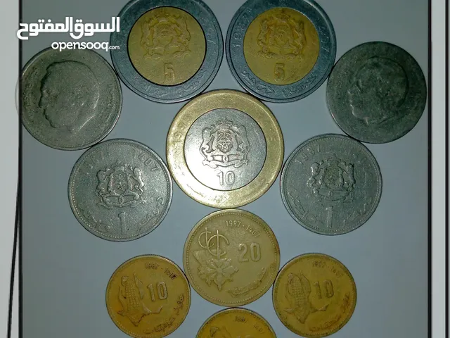 بيع عملات معدنية نقدية، قديمة و أثرية لسنة 1987 في عهد مولاي الحسن التاني .