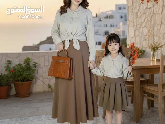 كابلز العيد  طقم قطعتين قميص وتنوره وبروش