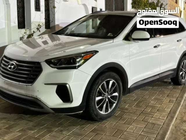 سنتافيا لونق 3 صفات لون ابيض جايا زواق دار  تبيلها زواق بركوربي أمامي وباب خلفي فيه خبطه بسيطه