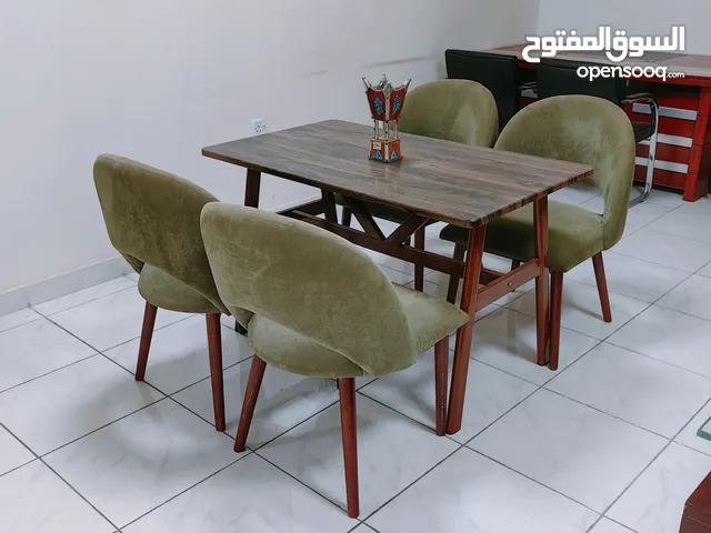 chair and table is wood and table is iron