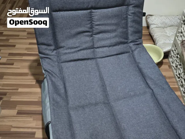 كرسي وسرير متنقل