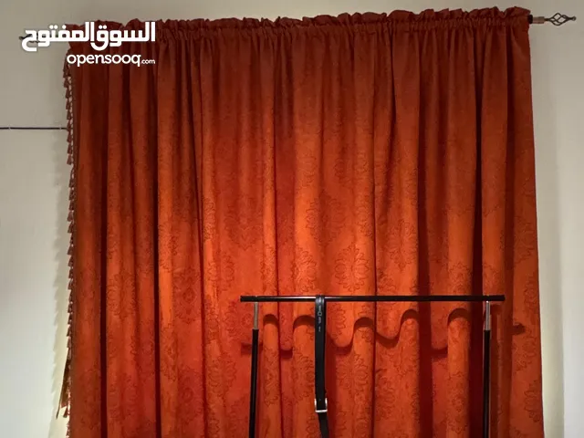 Curtains in different sizes with rods