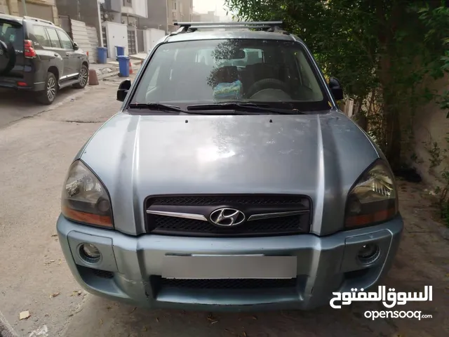 توسان 2009 خليجي بدون حادث فقط باب كلير رقم بغداد انكليزي للبيع ماشية 120