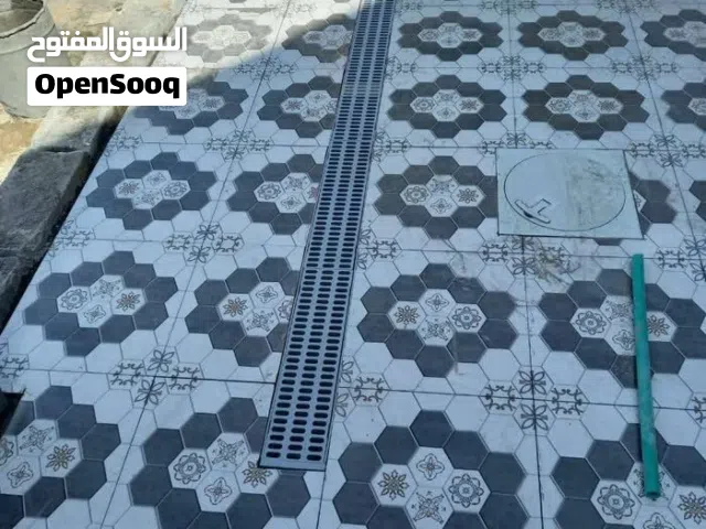 خلفه سيراميك والواح ودرج وبورسلان ومرمر