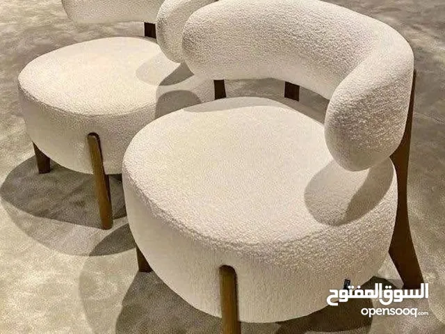 Custom Upholstered Armchair with Stylish Wooden Frame and Comfortable Seating