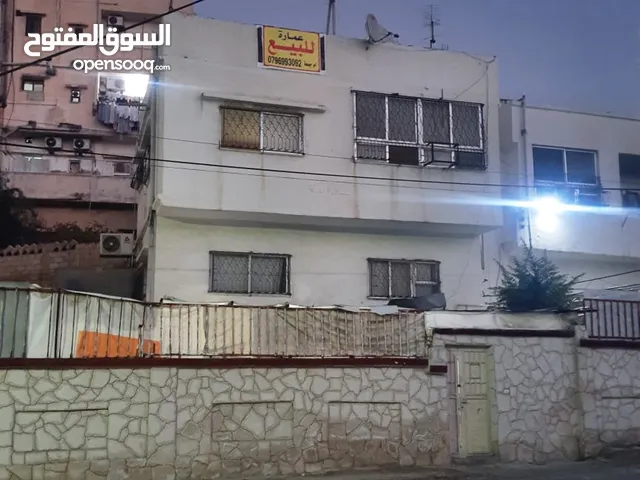 عماره للبيع بالزرقاء بسعر مغري جدا طابقين سبع شقق تنتين مستقلات 80الف