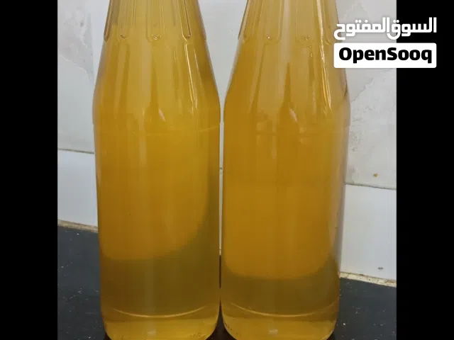 عسل عتم  صافي ومع الشمع