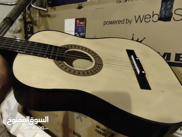 چيتار أمريكي شبية الياماها بالصوت جديد