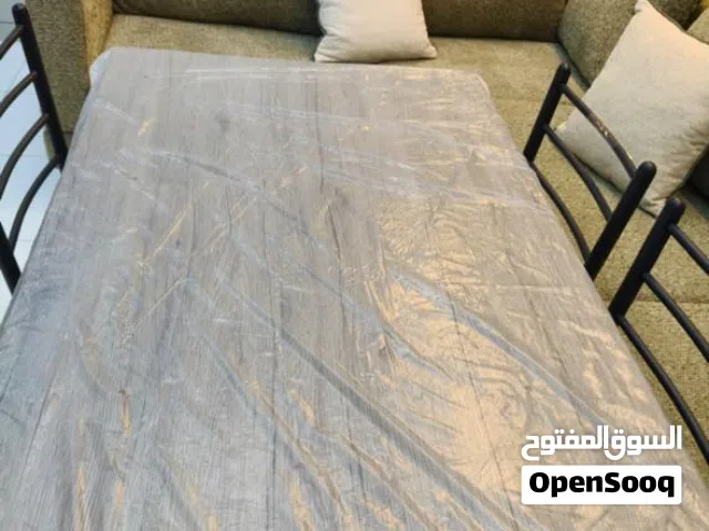 New Dining Table with 4 Chairs available