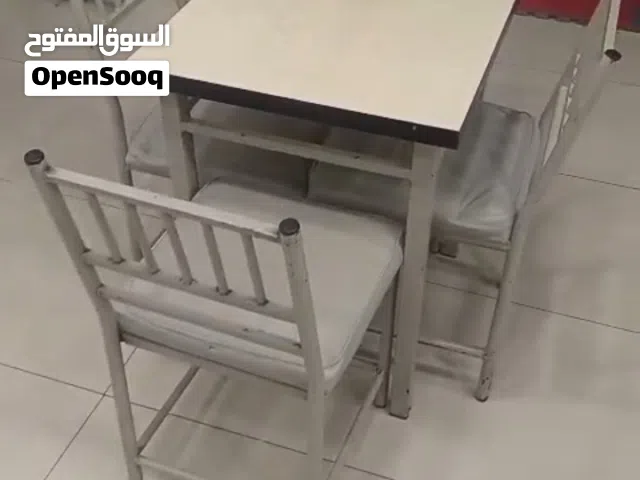 طاولة طعام خشب+4كراسي حديد منجد