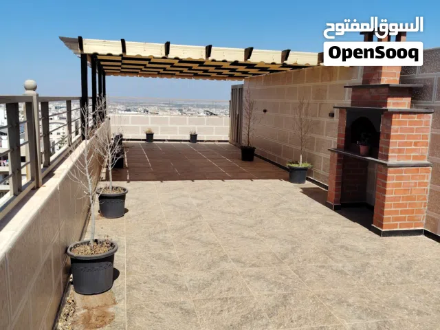 رووف مميز واطلاله بمساحة 218م جنوب كليه الطب لجامعه اليرموك خلف سوبر ماركت كارفور