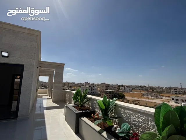 شقق جديدة كُلياً مميزة جداا للبيع بسعر مناسب اربد شارع البتراء