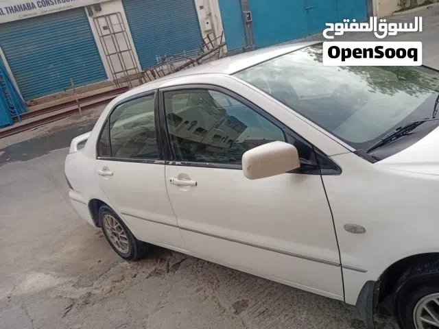 Mitsubishi Lancer 2002 Model "Sedan" Good Condition Gear Engine Ac all okay.