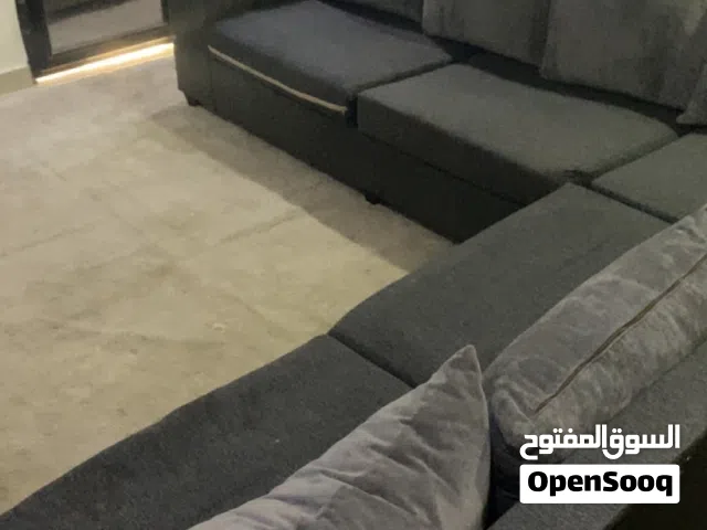 كنب زاويه (L-Shape) مودرن بحاله ممتازه- لون رمادي