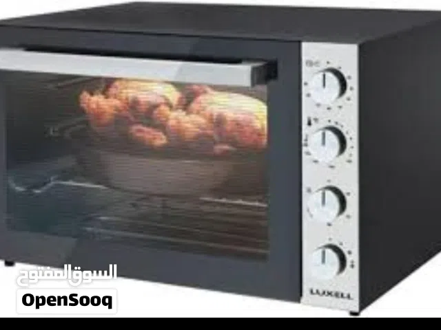 كوشه كهربائيه شبه جديد الحجم  70 لتر