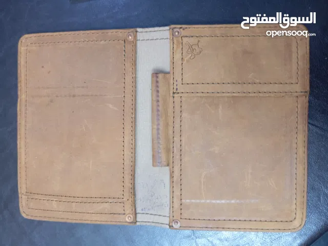 غلاف جلد اصلي حافظ للدفتر وقلم والمصاري