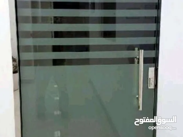 فني زجاج سكوريت ابواب وواجهات وتبديل مكاين ابواب