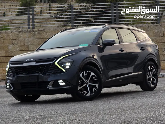 سبورتاج هايبرد 2023 - فل مسكر مع بانوراما - عداد قليل - غرفه مميزه جداً - سعر مميز جداً ع الكاش