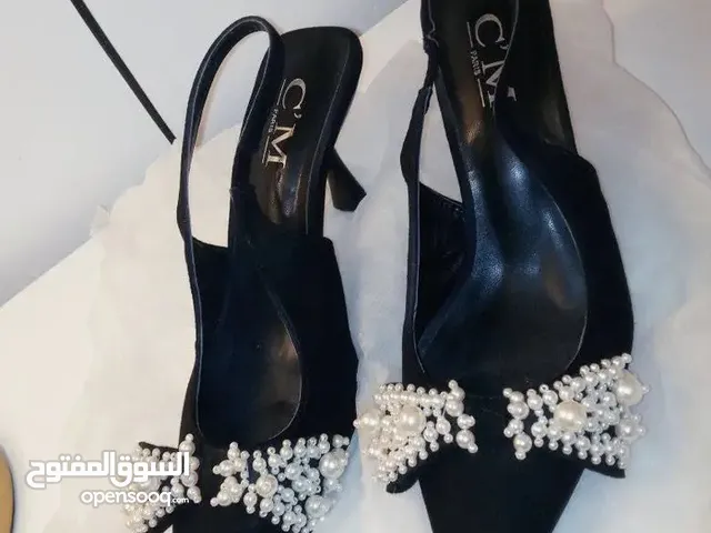 Black With Heels in Tripoli