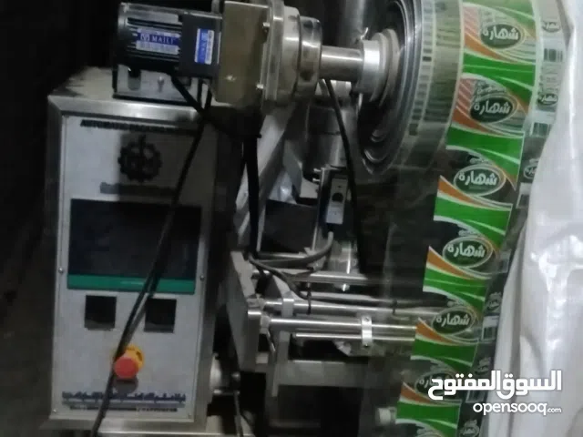ماكينة تعبئة وتغليف أوتوماتيكية عالية الكفاءة