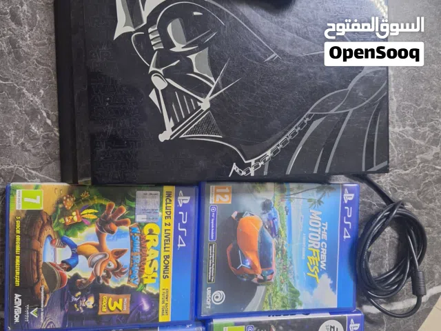 بلاستيشن 4 مع اربعة CD قابل للتفاوض
