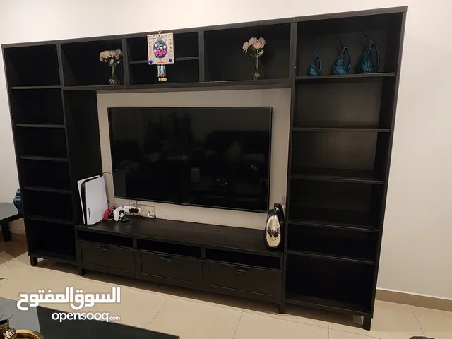 Stylish, modern wooden black cabinet and display shelves unit for TV