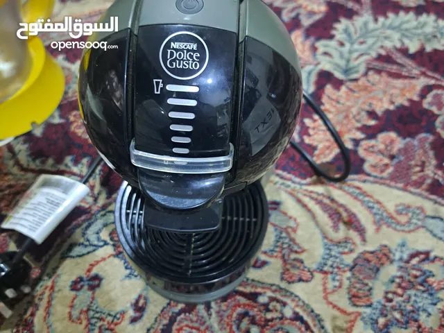 ماكينة قهوة اسبريسو وعصارة برتقال