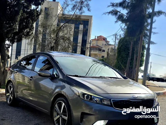 كيا سيراتو k3 بنزين فل مع فتحه