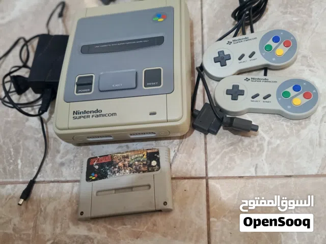 Nintendo super Famicom ( super  Nintendo) بحالة الوكالة  مع كل اغراضه