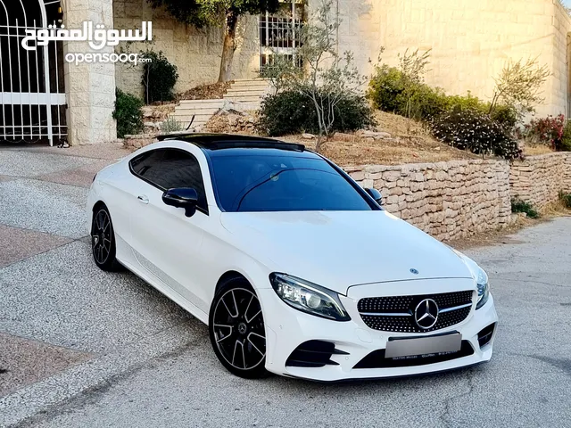 مرسيدس C300 2020/ فل مسكر بانوراما عداد ديجتال فرش عسلي / ولا جرام بويا / بالكررراتين وكالة