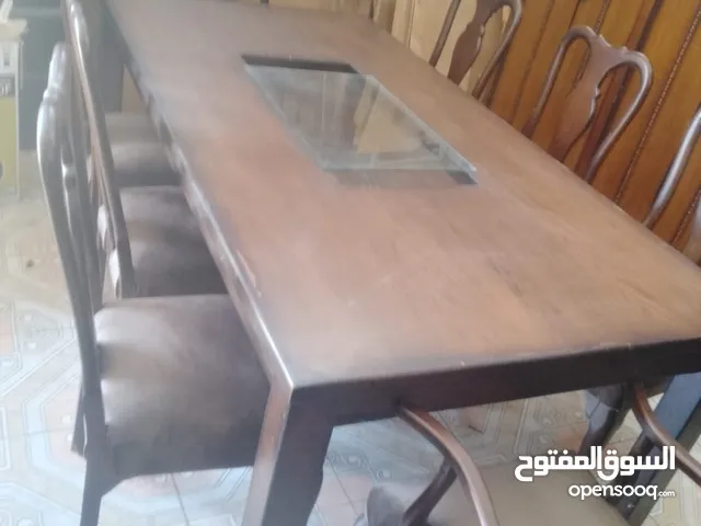 طاولة سفرة خشب زاااااان تنجيد جديد بسعر 100 دينار
