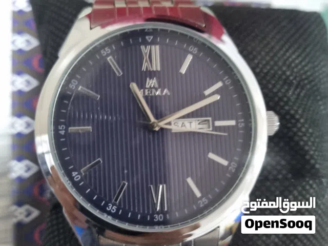 Original Mema Watch New Blue background.