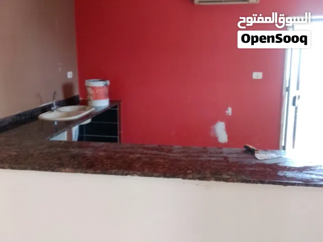 قطعة ارض فى الدبلوماسي خلف مصنع مياة اسيل