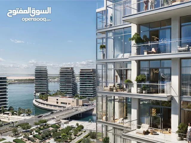 Own a fully furnished 3-bedroom apartment in a project directly on Al Raha Beach, with a full sea vi